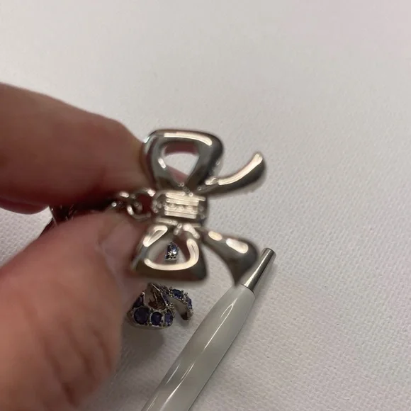 Elegant Coach Bow Keychain with Multicolor Crystals and a White Coach Pen - Picture 5 of 6